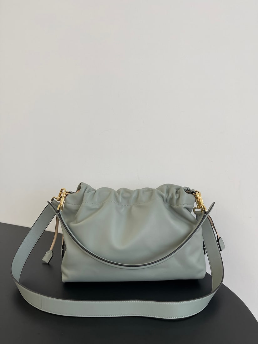Fendi Mamma Baguette: The large, dark green Mamma Baguette is a combination of a baguette and a lucky bag, arguably the most gentle bag online. The soft, supple lambskin is incredibly delicate, exuding both a relaxed and