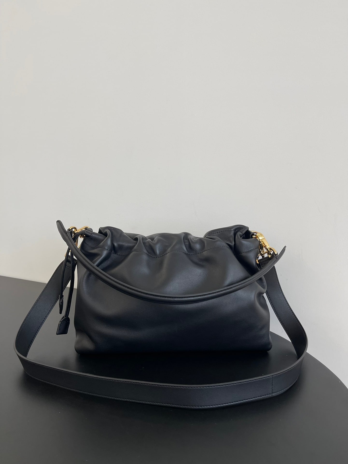 Fendi Mamma Baguette: The large black Mamma Baguette is a combination of a baguette and a lucky bag, arguably the most delicate bag online. The soft, supple lambskin is incredibly smooth and luxurious, exuding both a