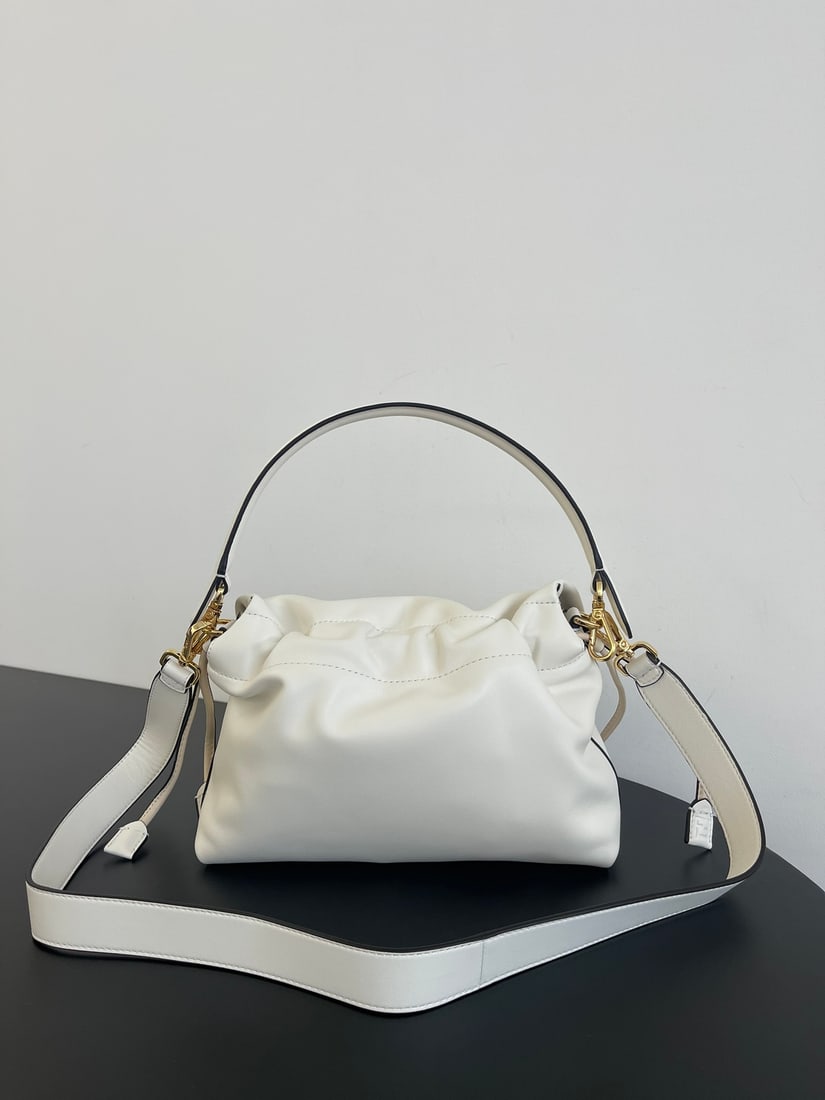 Fendi Mamma Baguette: The medium-sized white Mamma Baguette is a combination of a baguette and a lucky bag, arguably the most gentle bag online. The soft, supple lambskin is incredibly delicate, exuding both a relaxed and 