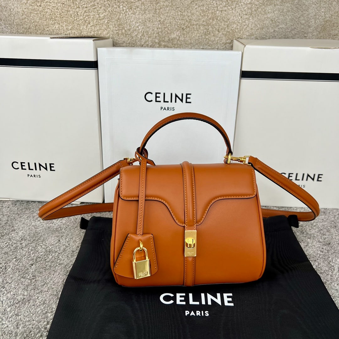 Celine: 16. Mini handbag made of cowhide leather, measuring 17.5 x 14 x 7 cm. This mini handbag can just fit a large smartphone like the PLUS. Made of cowhide leather with a sheepskin lining, gold-tone finish