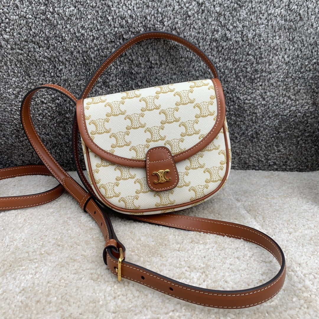 Celine: BESACE Mini Logo Print Couvas Leather Handbag, 15x11x4 cm, featuring the TRIOMPHE CANVAS logo print, couvas leather trim, fabric lining, crossbody and shoulder carry, flap with metal snap closure, one