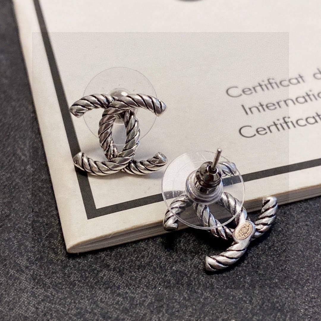 Chanel vintage silver stud earrings with the double C logo: Chanel Double C Letter Vintage Silver Stud EarringsWonderful gift for you or your loved one.We offer consoilidated shipment for all goods to our domestic and international customers at affordable pric