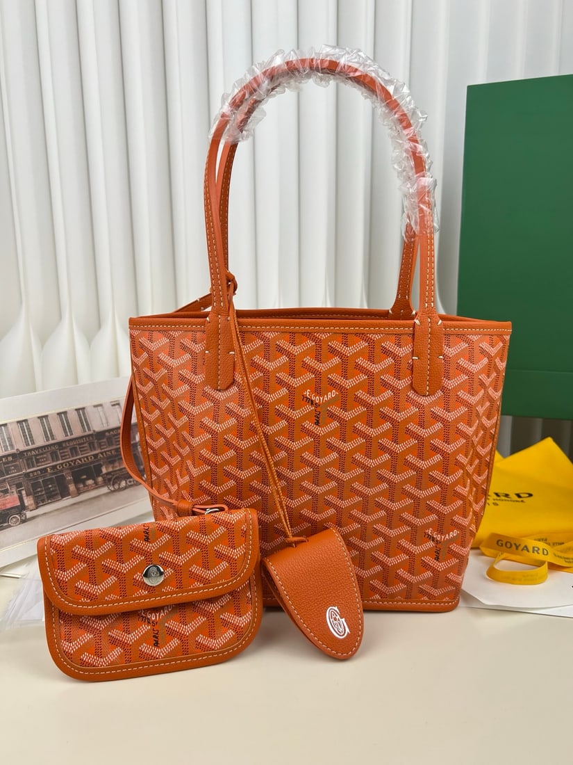 Goyard Tote Mini Anjou: The Goyard TOTE MINI ANJOU is an understated yet stylish reversible mini tote bag crafted from Italian calfskin. The leather is incredibly soft and supple to the touch. The monogram print paired with 
