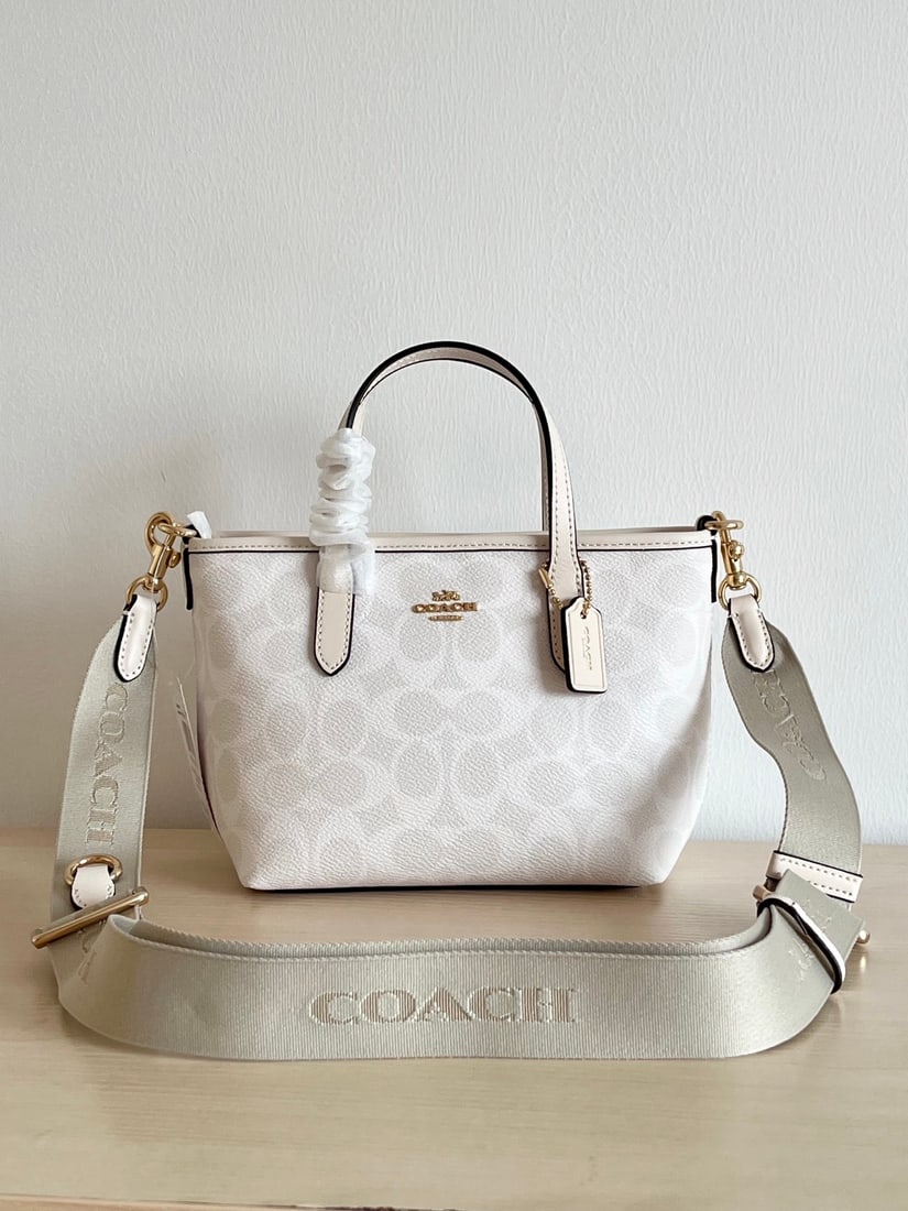 Coach: Coach Mini City Tote Bag, with a simple and stylish design, featuring classic C-shaped fabric paired with cowhide leather for a premium feel. It easily complements both casual and elegant styles. Not 