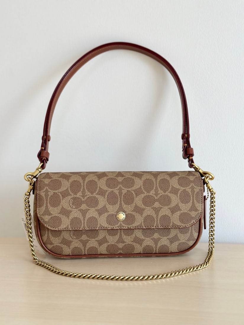 Coach: The Coach Brook baguette bag comes in two materials: cowhide and monogram canvas. It's incredibly lightweight and offers three carrying options to suit various styles. The double shoulder straps are
