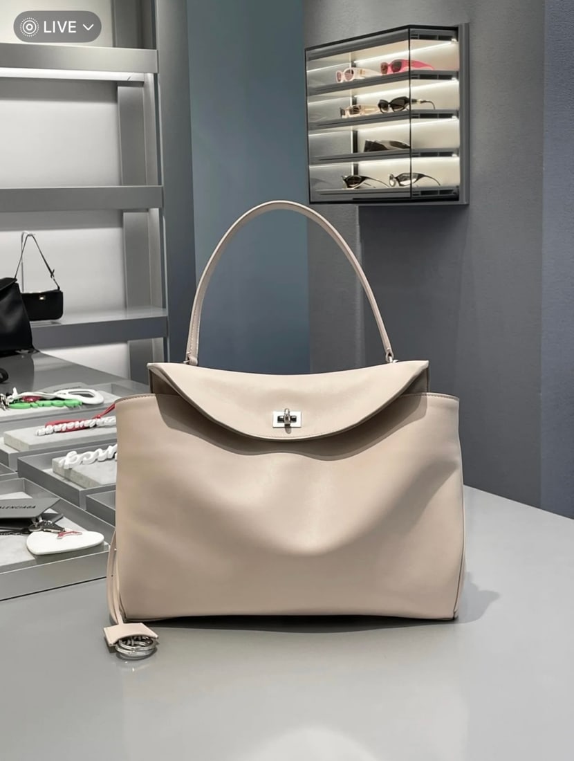 Balenciaga: Apricot, a low-saturation color, is both stylish and elegant. A wonderful gift for you or your loved one. We offer consoiled shipping for all goods to our domestic and international customers at affor
