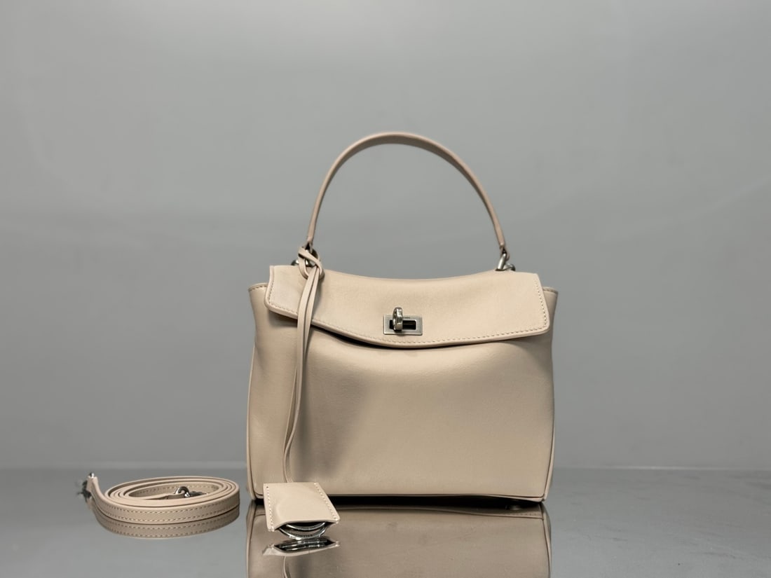 Balenciaga Rodeo Bag series handbags: The mini Balenciaga Rodeo Bag in apricot and silver hardware redefines the style, its relaxed, slouchy silhouette perfectly complementing Balenciaga's signature look, exuding a rebellious spirit. The 