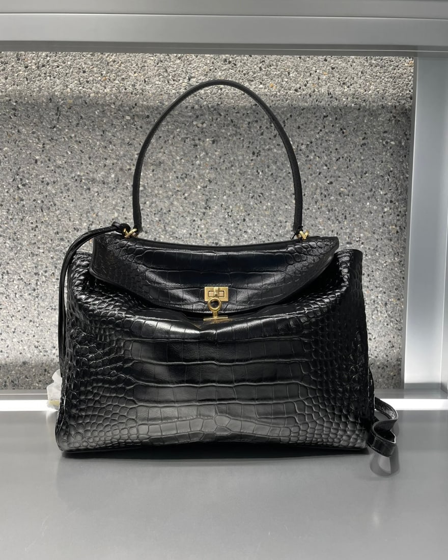 Balenciaga: Bainciaga's crocodile pattern remains a classic and timeless design. A wonderful gift for you or your loved one. We offer consoiled shipping for all goods to our domestic and international customers a
