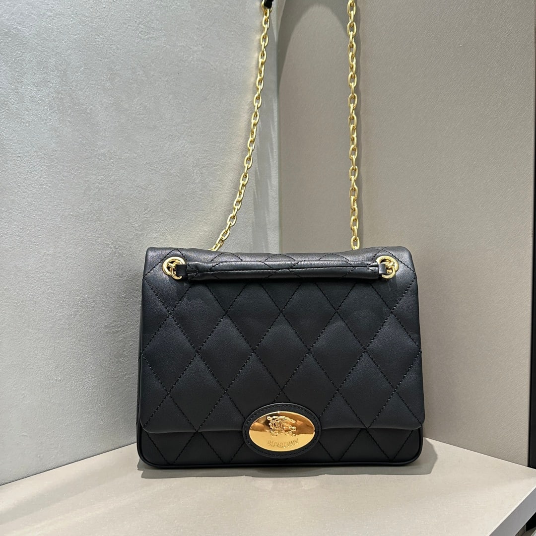 Burberry: Crafted from quilted calfskin, this bag features a uniquely crafted, supple surface. Its elegant design is adorned with a metal equestrian emblem, a motif inspired by iconic 1980s brand bags. It comes