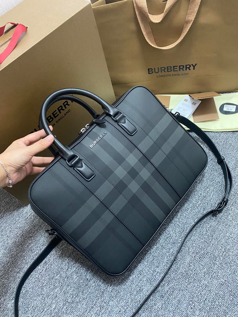 Burberry briefcase: This Burberry briefcase, crafted from checkered and Italian-tanned leather, is adorned with the brand's logo. It can be carried by hand or over the shoulder using the detachable strap. At least 30% of