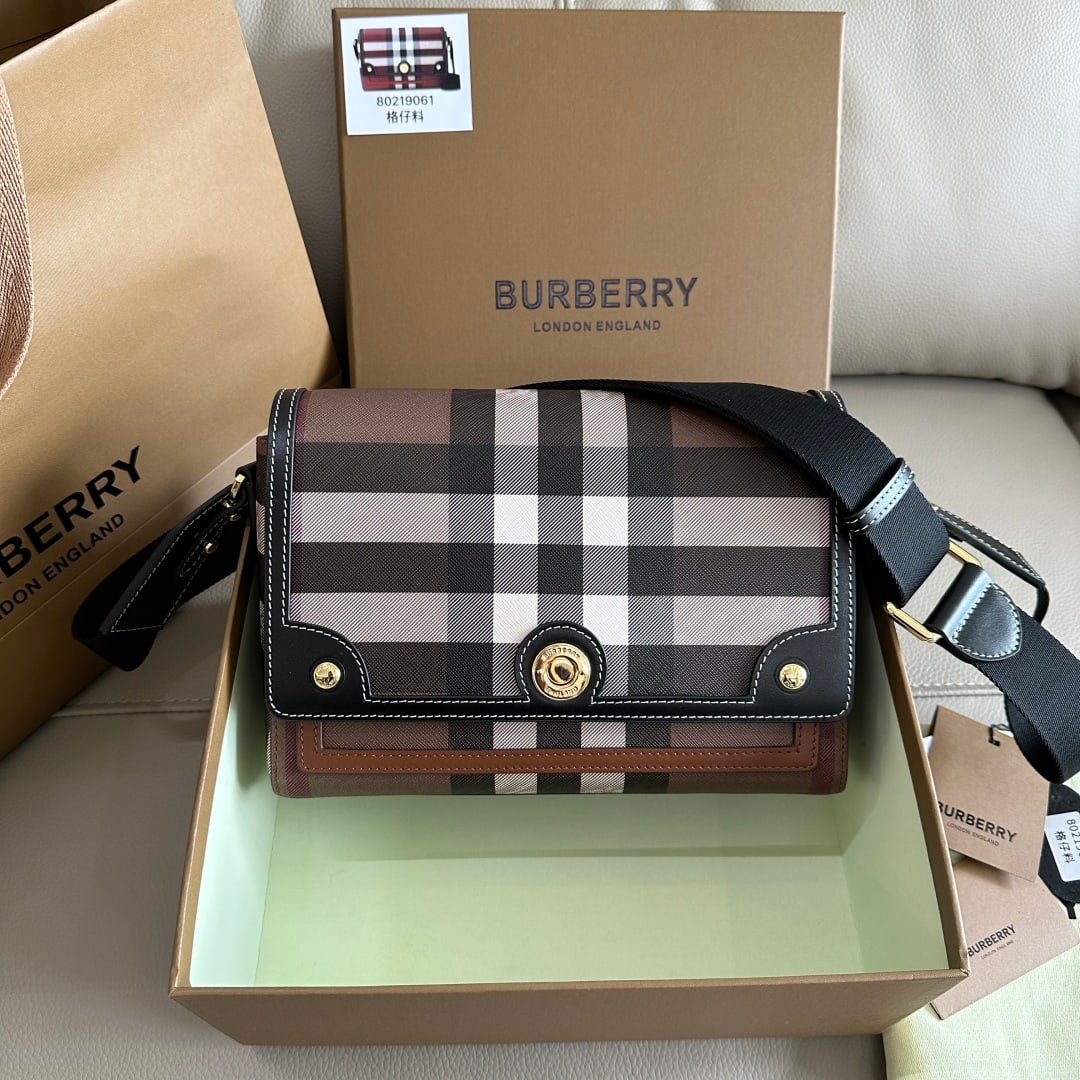 Burberry: The Burberry Note classic check crossbody bag is crafted from the brand's Vintage check eco-friendly canvas and smooth Italian tanned leather. Its highly recognizable classic check pattern exudes eleg