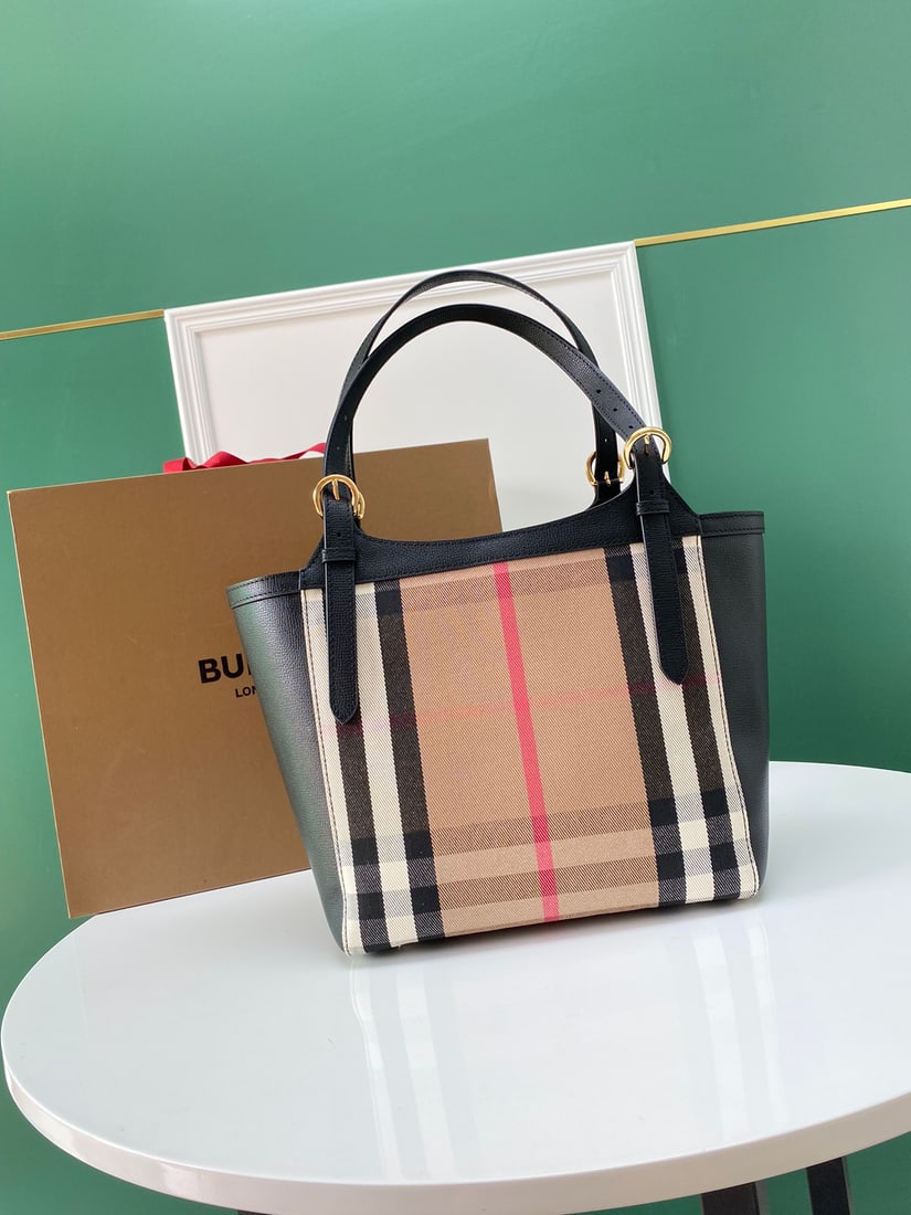 Burberry The Canter: Burberry's iconic The Canter handbag, crafted from luxurious grained leather and paired with finely spun House Check cotton panels, is made in Italy. The equestrian-inspired shoulder strap is inspired