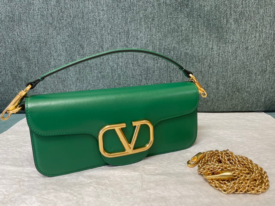 Valentino: Valentino calfskin handbag with metal V-logo Signacar trim - features detachable handles and a detachable sliding chain for shoulder, crossbody, or hand carrying. Vintage brass distressed finish hardw