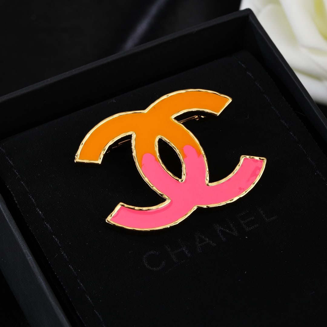 Chanel double C brooch: This Chanel double C brooch is exquisitely detailed; the design is absolutely stunning. It's incredibly beautiful and ethereal a must-have for any sophisticated young woman. A wonderful gift for you o