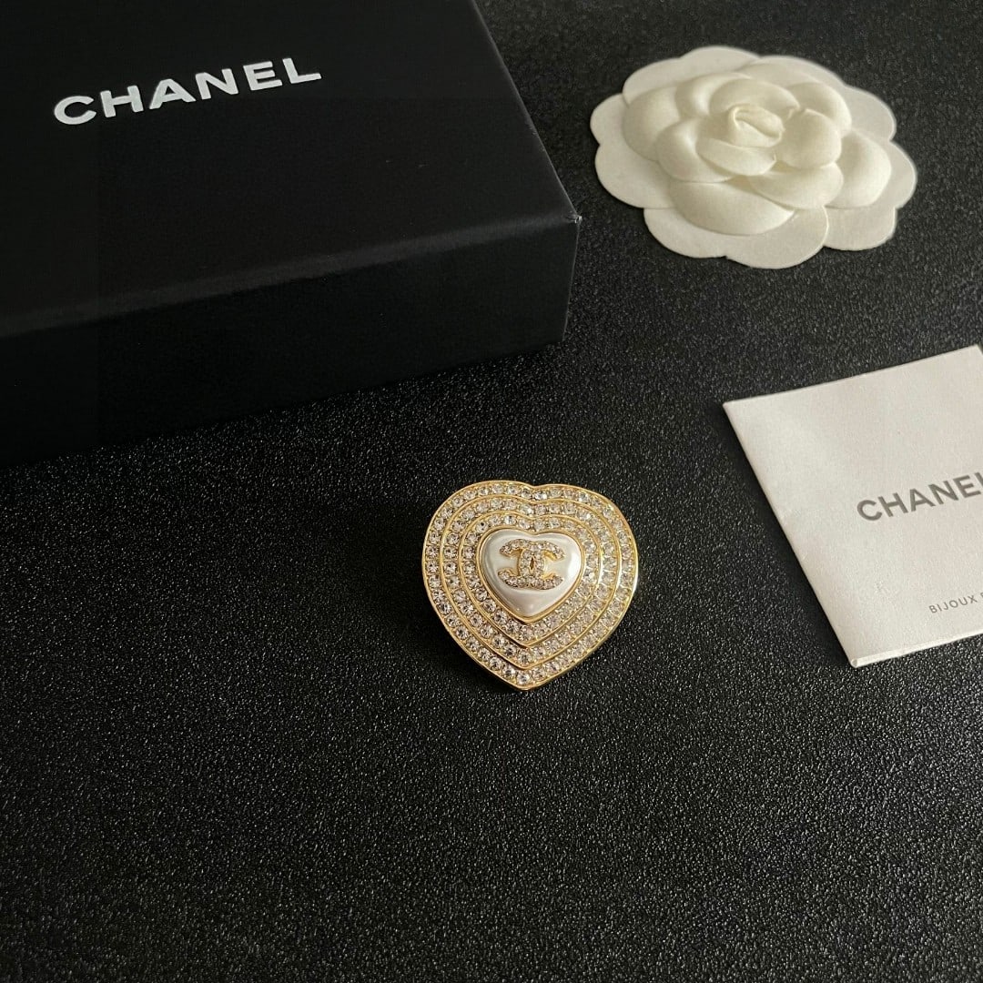 CHANEL Brooch: CHANEL brooches are the most understanding accessories for women. Women who have poured their hearts and souls into being themselves often cherish the meaning of their brooches. A wonderful gift for y