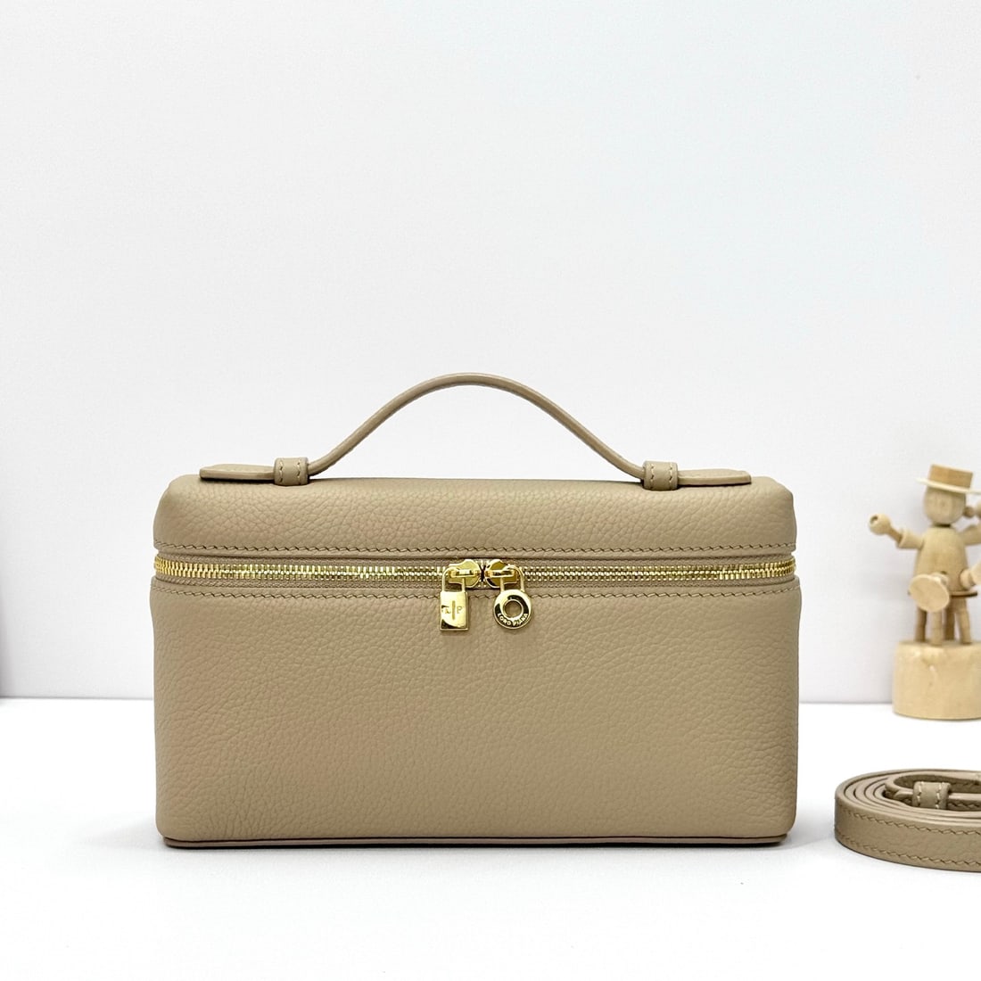 Loropiana Extra Pocket L19 Clutch: Loropiana Extra Pocket L19, light frankincense color with gold hardware. This is a functional clutch with a wide opening, combining classic style and minimalist design. The bag is made of calfskin wit