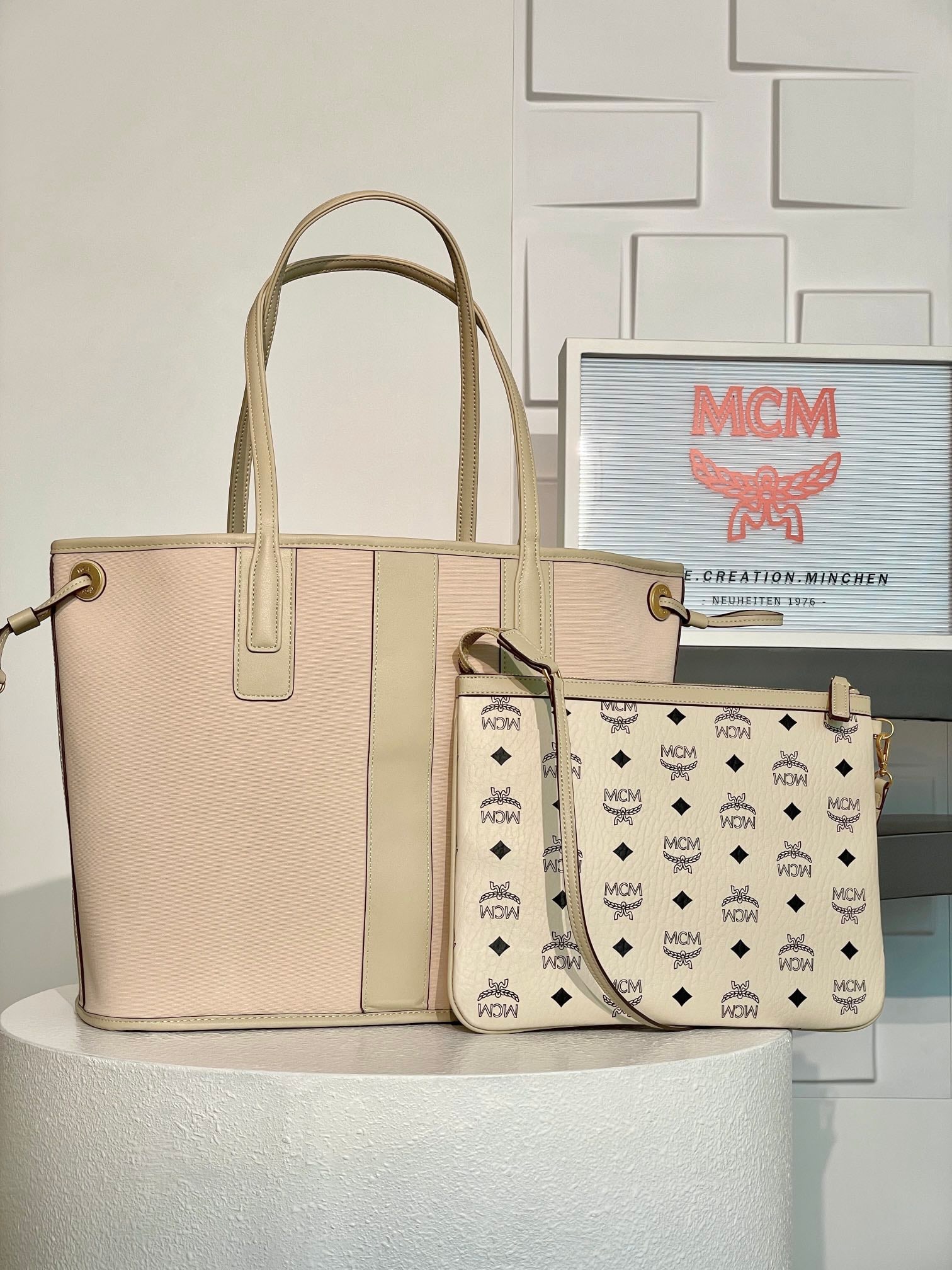 MCM LIZ VISETOS Medium Off-White Reversible Shopping Bag: MCM LIZ VISETOS Medium Beige Reversible Shopping Bag. This medium-sized Liz shopping bag combines two classic silhouettes into one iconic everyday bag. Crafted from beige Visetos and Nappa leather, th