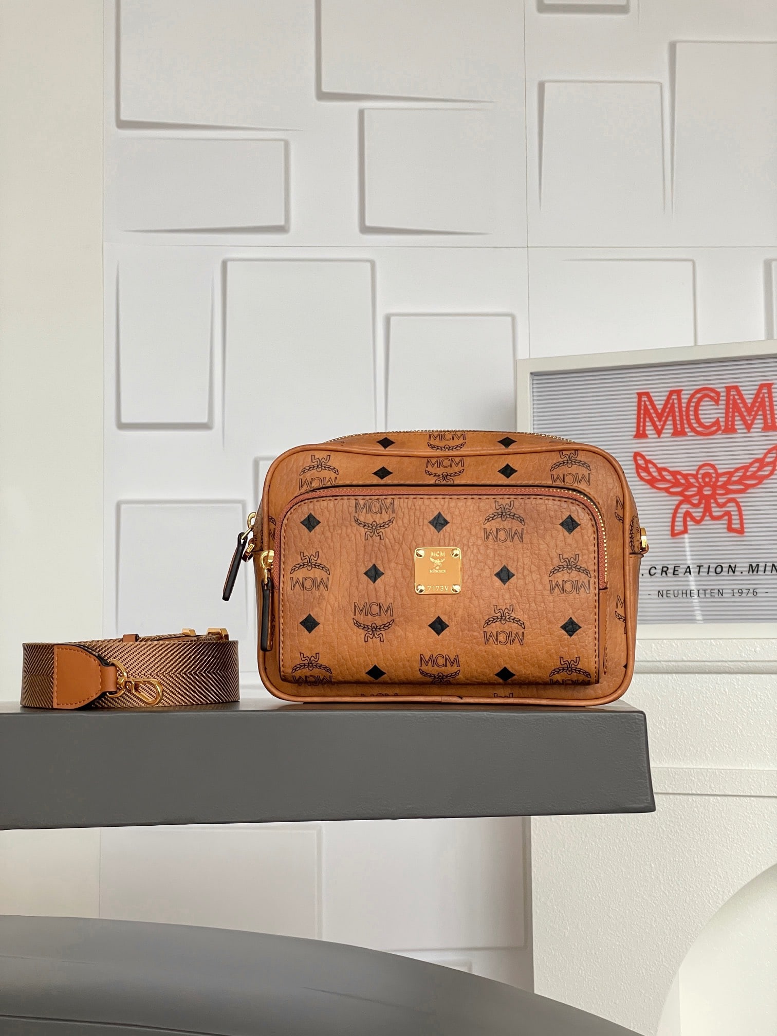 MCM AREN VISETOS Small Crossbody Shoulder Camera Bag: MCM AREN VISETOS Small Crossbody Shoulder Camera Bag in Classic Cognac. As its name suggests, the Aren crossbody bag is the essential bag for creating a stylish look. Designed for mobile travelers