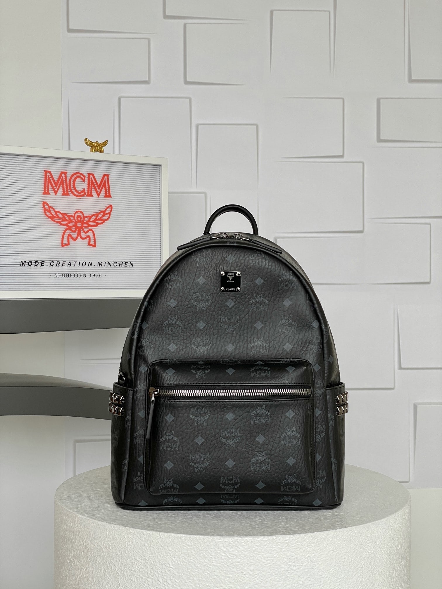 MCM STARK VISETOS Medium Studded Backpack: MCM STARK VISETOS Medium Studded Backpack, Black with All-Over Monogram Print # Unisex Bag # The Coolest Black Ceiling in a Backpack This backpack boasts a well-structured design, crafted from classic