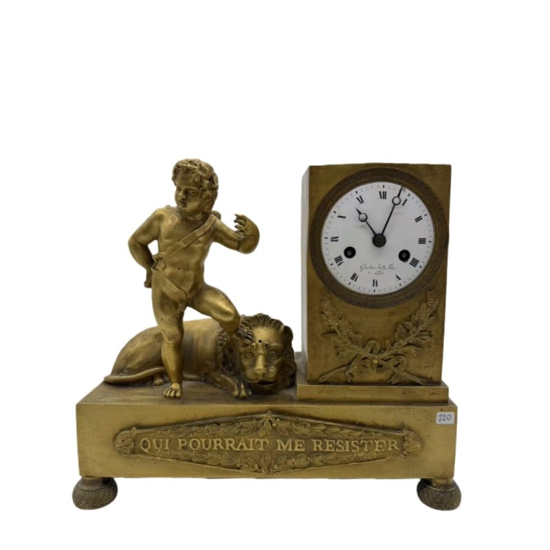Clock: H 24cm W 28cm