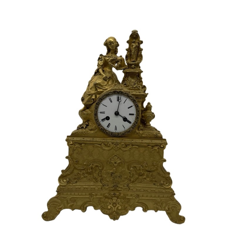 Clock: H 36cm W 27cm