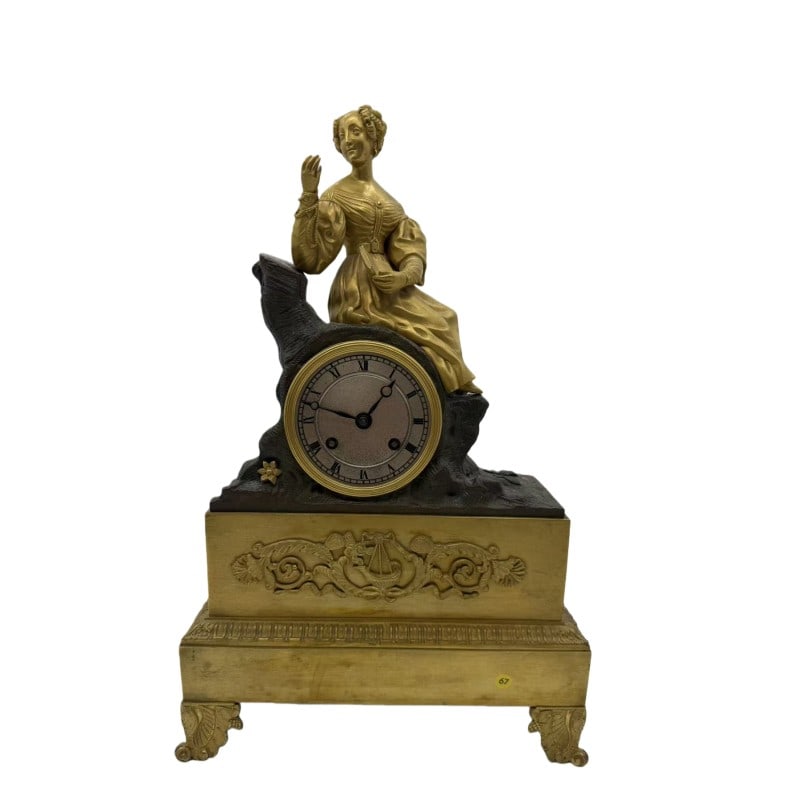 Clock: H 39cm W 26cm
