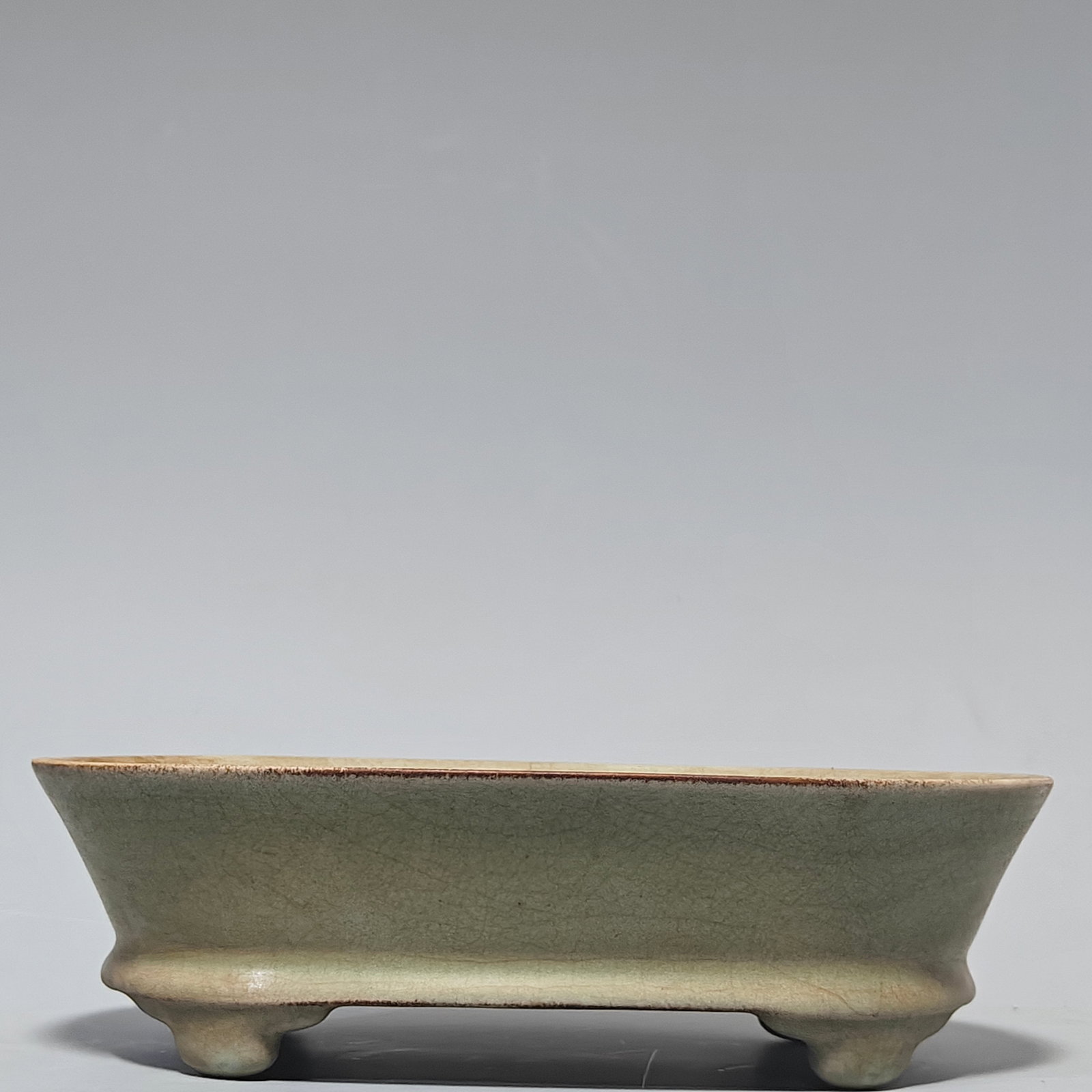 Porcelain: Song Dynasty Guan Kiln Ru Ware Narcissus Basin Ornament: Porcelain: Song Dynasty Official Kiln Ru Ware Narcissus Basin Ornament: This piece is beautifully and elegantly shaped, handcrafted with exquisite workmanship. The glaze is delicate and smooth, posses