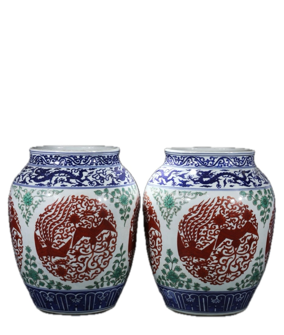A pair of blue and white porcelain jars with red enamel decoration and phoenix design on four sides, (1 of 9)