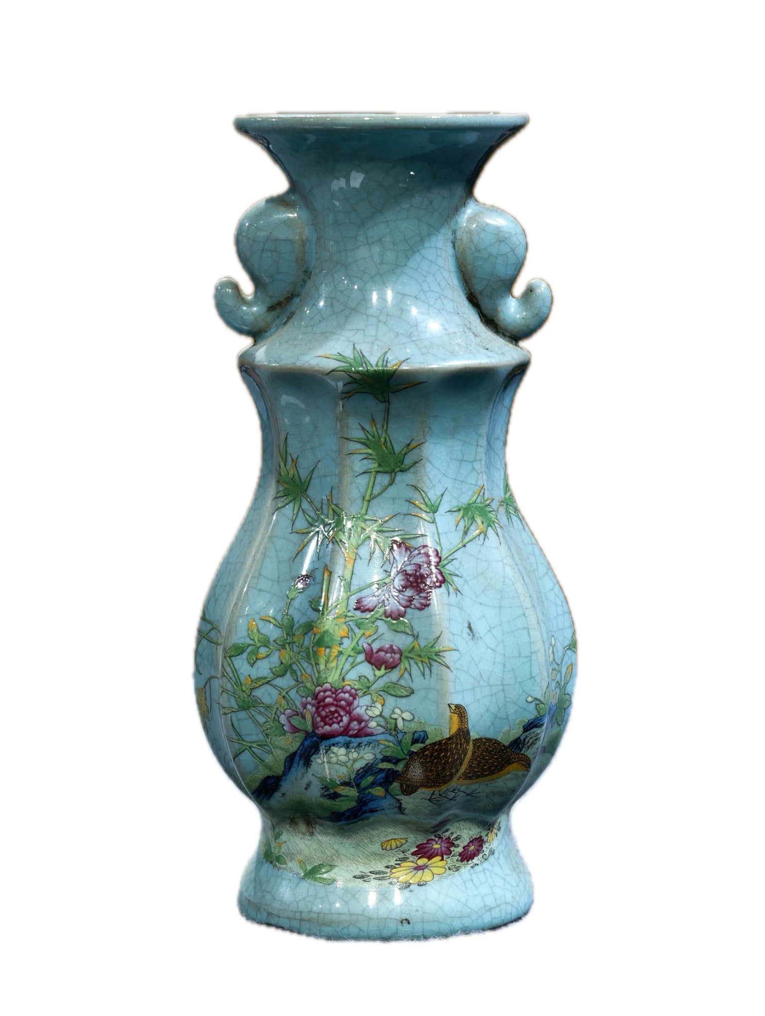 A celadon-glazed vase with small crackled glaze and overglaze floral and bird designs, bearing the (1 of 9)