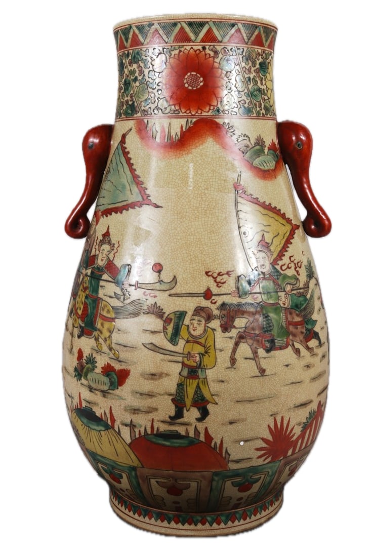 A polychrome vase with elephant-ear handles and the inscription "Made in the Wanli period of the: A polychrome vase with elephant-ear handles and a story of female warriors and warriors, dating from the Wanli period of the Ming Dynasty. It measures 57 cm in height and 31 cm in width. Provenance:An