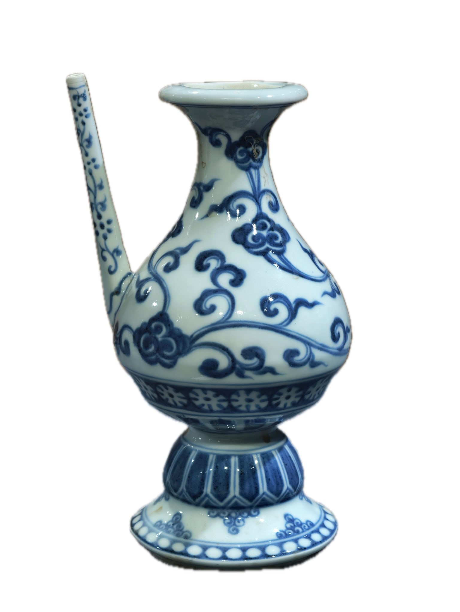 A blue and white porcelain ewer with a hand-painted lotus scroll design, bearing the mark "Made in: A blue and white porcelain ewer with a hand-painted lotus scroll design, bearing the mark "Made in the Xuande period of the Ming Dynasty," measuring 22 cm in height and 12 cm in width. Provenance:An o