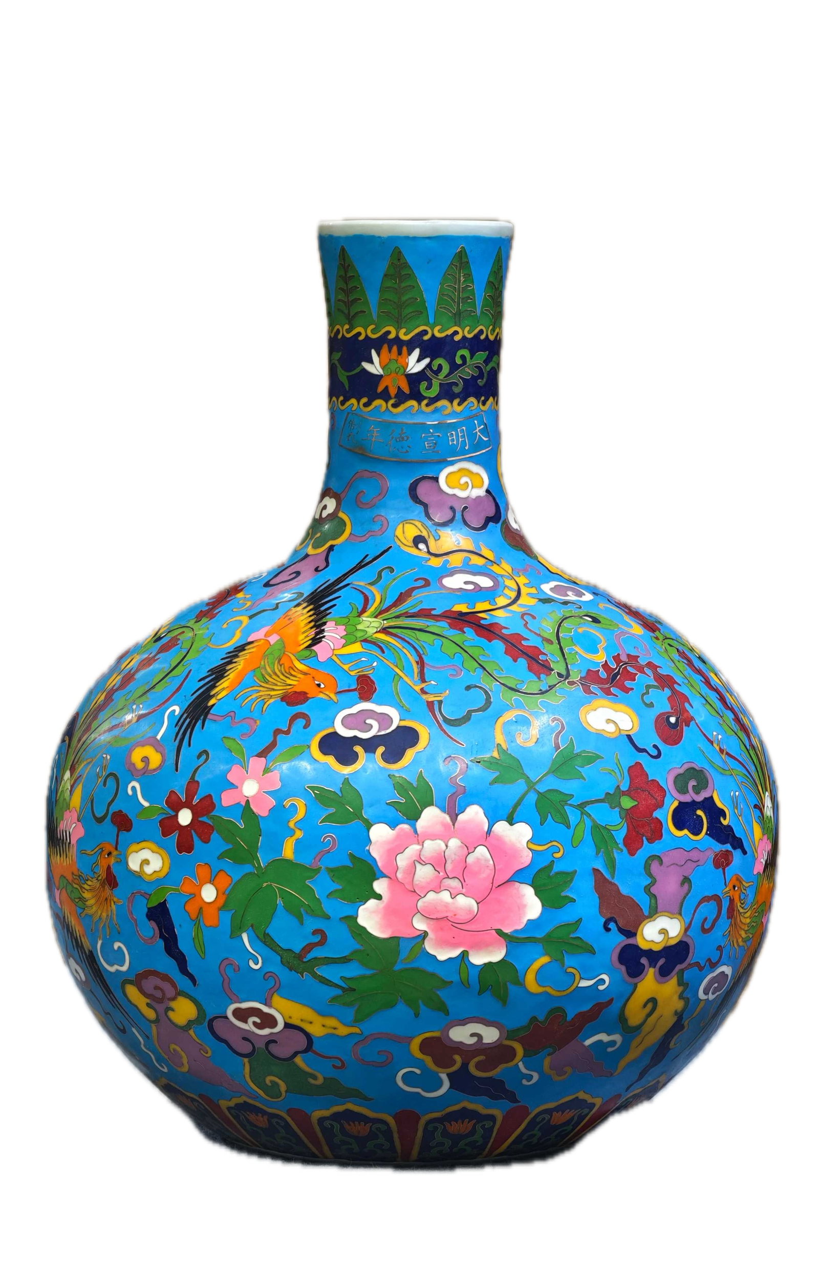 A handmade cloisonne enamel vase with phoenix and peony design, bearing the mark "Made in the Xuande: handmade cloisonne vase with a phoenix and peony design, bearing the mark "Made in the Xuande period of the Ming Dynasty," measuring 46 cm in height and 26 cm in width. Provenance:An old private colle