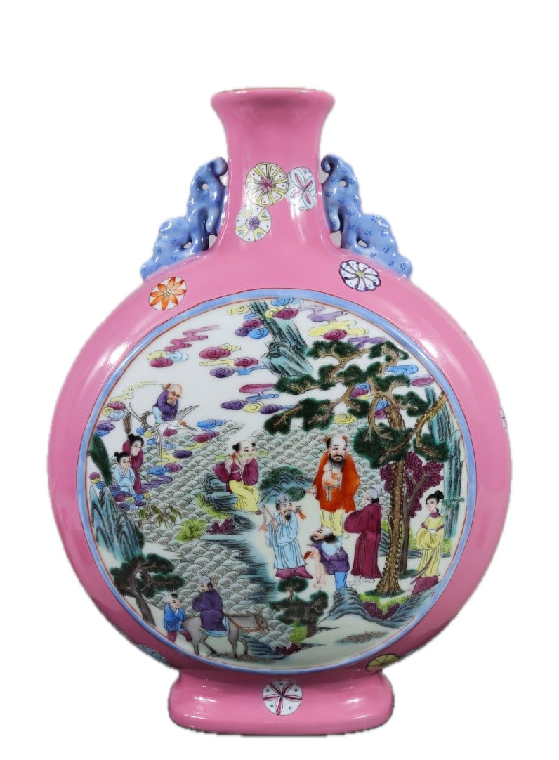 A famille rose moon flask with dragon-shaped handles and double-sided windows depicting immortals: A famille rose moon flask with dragon-shaped handles and double-sided windows depicting immortals celebrating longevity, formerly in the collection and marked "Made in the Qianlong Reign of the Great 
