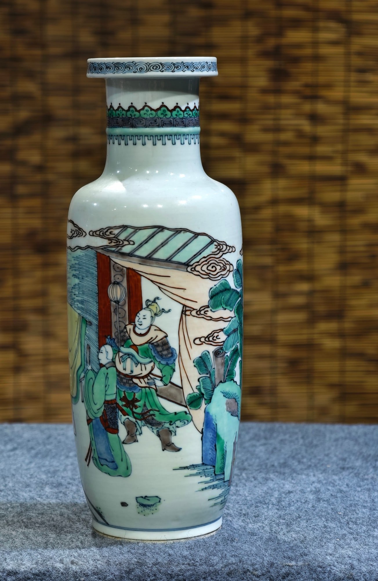 A Qing Dynasty official kiln double-ring doucai vase with figure and story design.: A Qing dynasty imperial kiln double-ring doucai vase with figure and story design, 30.5 cm high and 12 cm wide. Provenance:From a noted private collection in Bavaria, Germany. We warmly invite collect