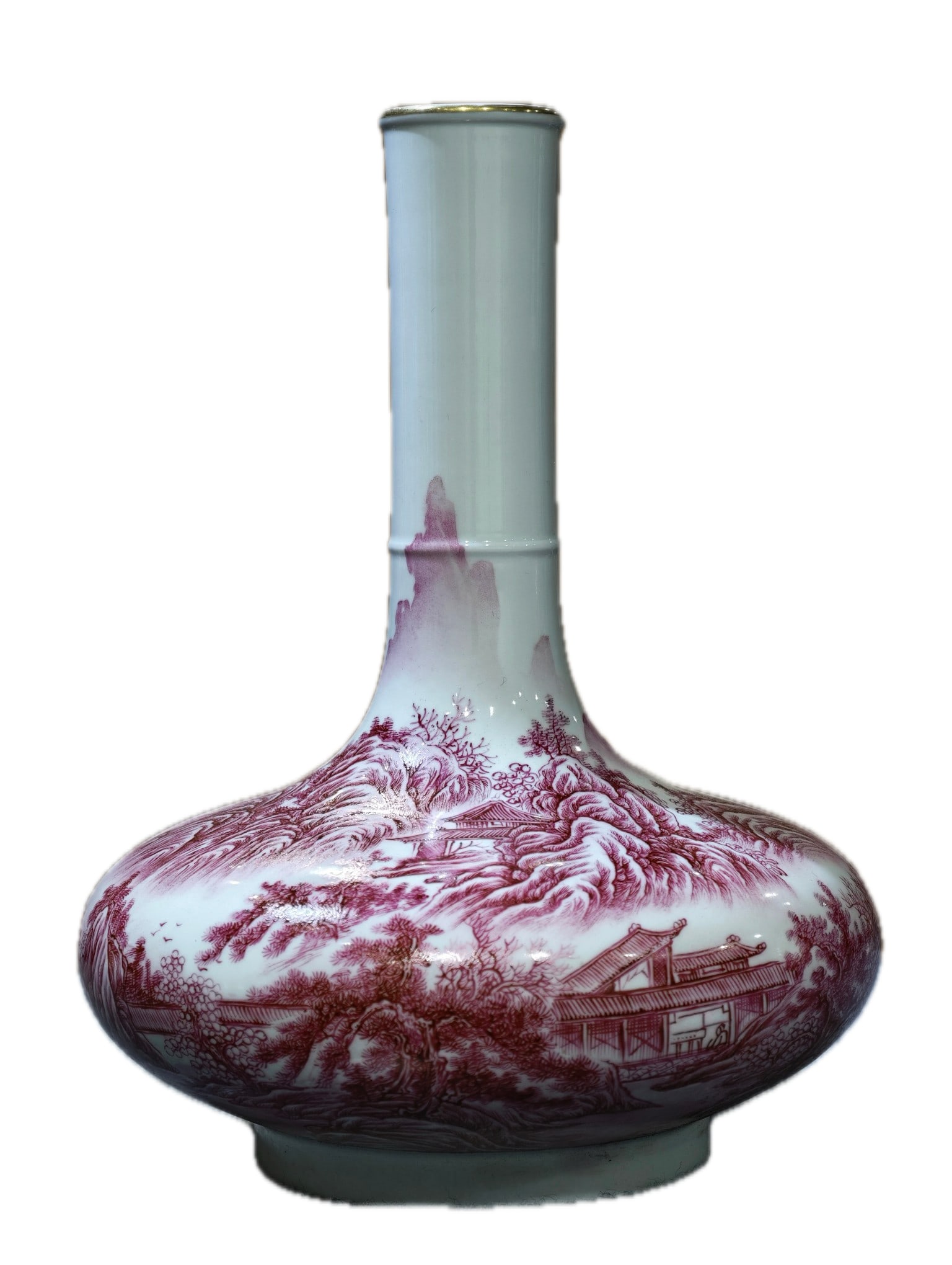 A long-necked duster vase with a rouge-red glaze and gilt decoration, bearing the mark "Made in the: A rouge-red glazed, gilt-decorated long-necked duster vase, formerly in the collection and marked "Made in the Yongzheng Reign of the Great Qing Dynasty," 31 cm high and 22 cm wide. Provenance:From an