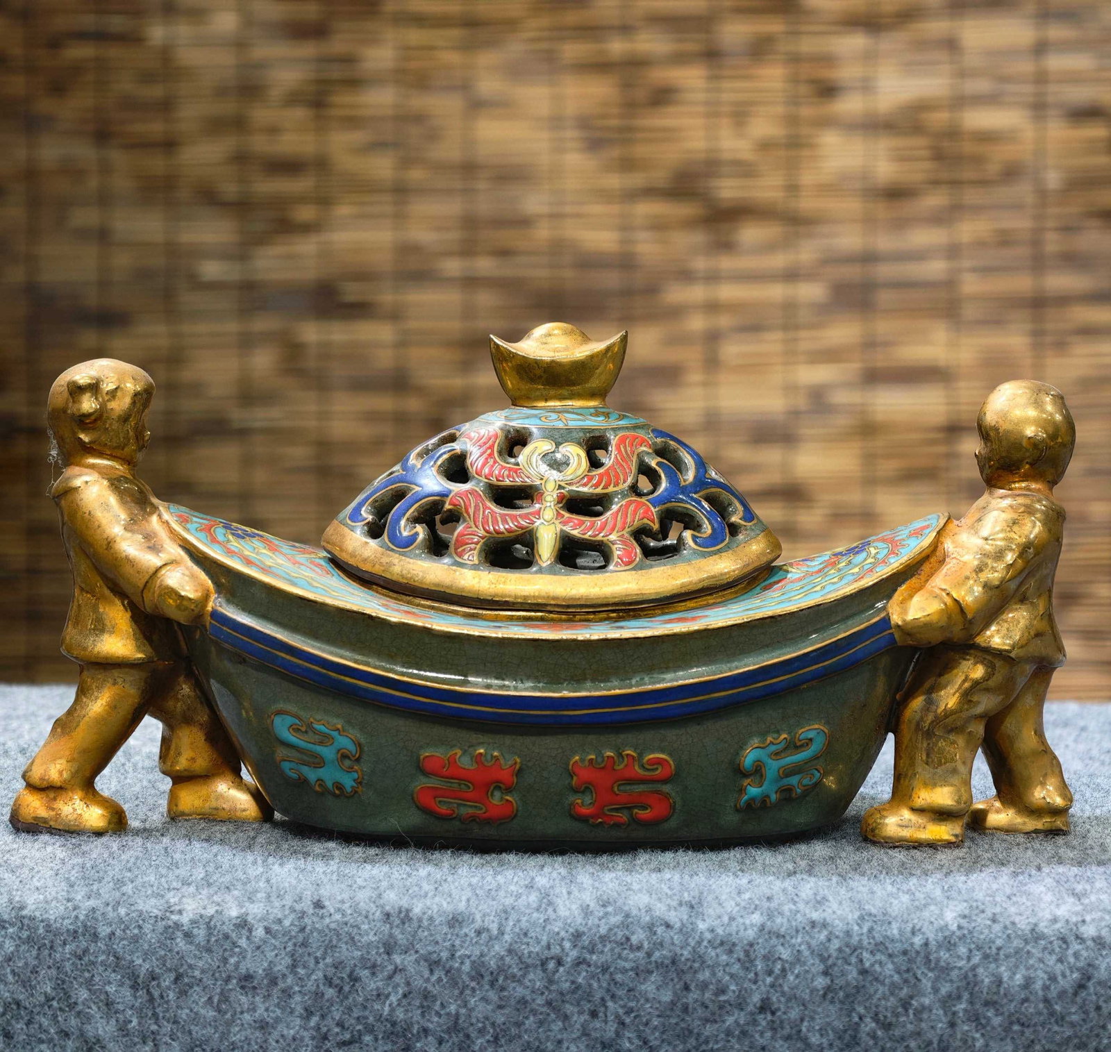Longquan ware incense burner with gilt decoration and openwork design, formerly in the collection: A Longquan ware incense burner with gilt and polychrome decoration, formerly in the collection and marked "Feng Hua". 14 cm high, 30 cm wide. Provenance:From an old private estate in Paris, France. Th