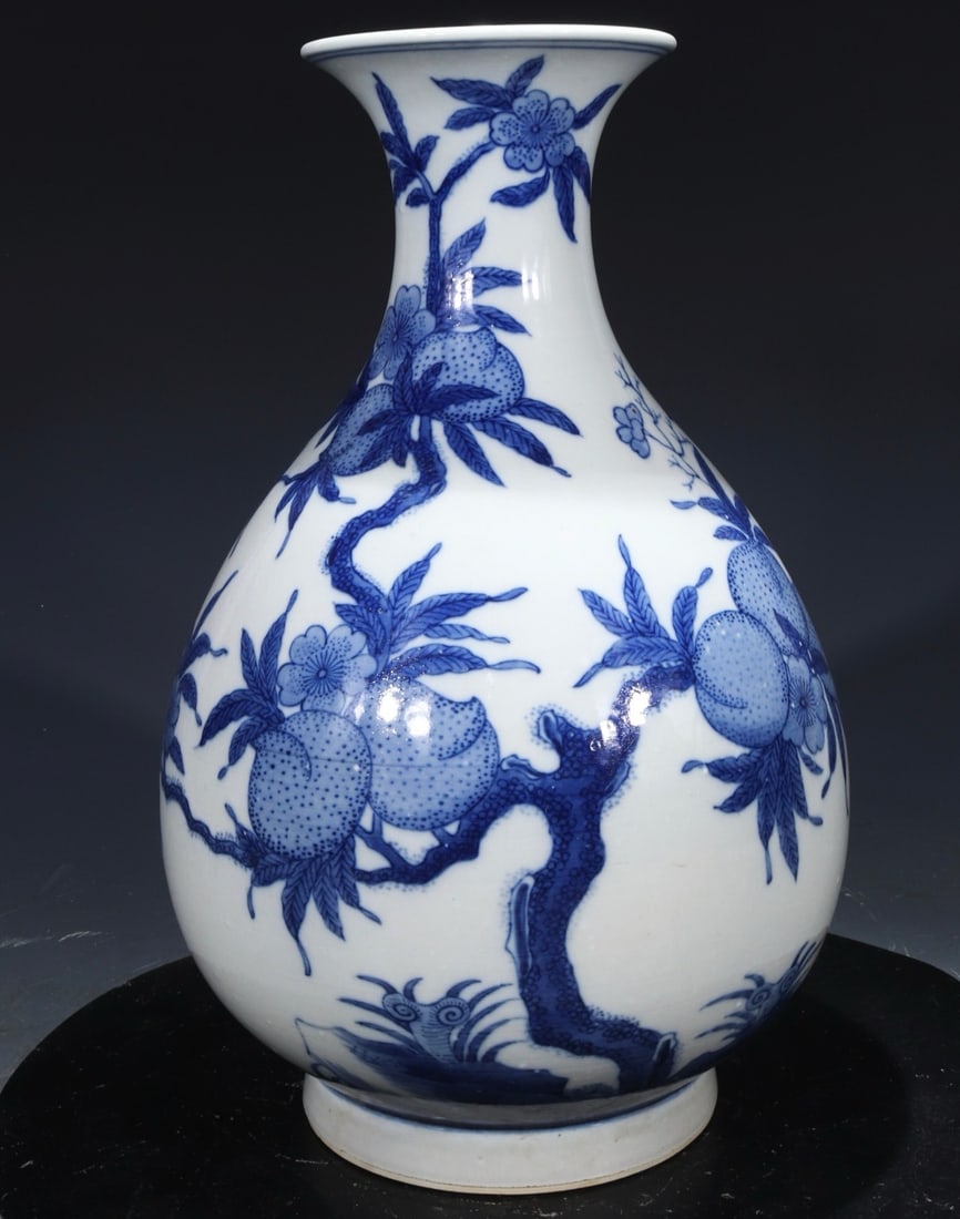 Formerly in the collection, marked with the inscription "Made in the Kangxi Reign of the Great Qing: Formerly in the collection, marked "Made in the Kangxi Reign of the Great Qing Dynasty," a blue and white porcelain Yuhuchun vase with a design of longevity and good fortune, 33 cm high and 22 cm wide