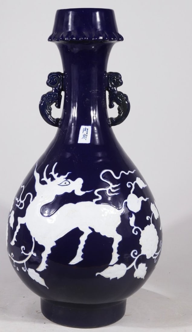 A Yuan Dynasty celadon-glazed vase with a phoenix design in white glaze, formerly in the collection.: A Yuan dynasty celadon-glazed vase with a phoenix design in white glaze, 61 cm high and 30 cm wide. Provenance:Private collection, Roma, Italy. We warmly invite collectors, colleagues, and friends to 