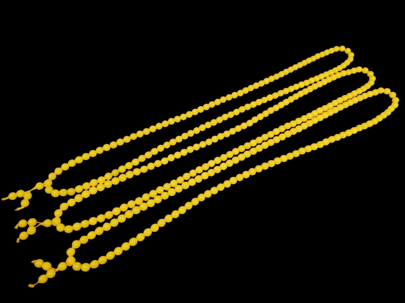 Three sets of treasured amber prayer beads (1 of 9)