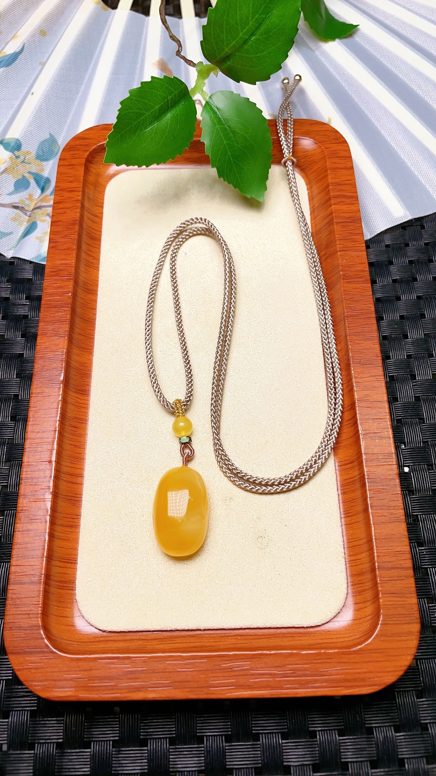Original handmade custom natural amber teardrop pendant: Original handmade natural amber teardrop pendant with a lustrous, oily sheen. Dimensions: 23.1 x 14.9 x 10 mm (3mm). Comes with a fine cord. Total weight: 4.3g. Simple, elegant, and versatile. Provena