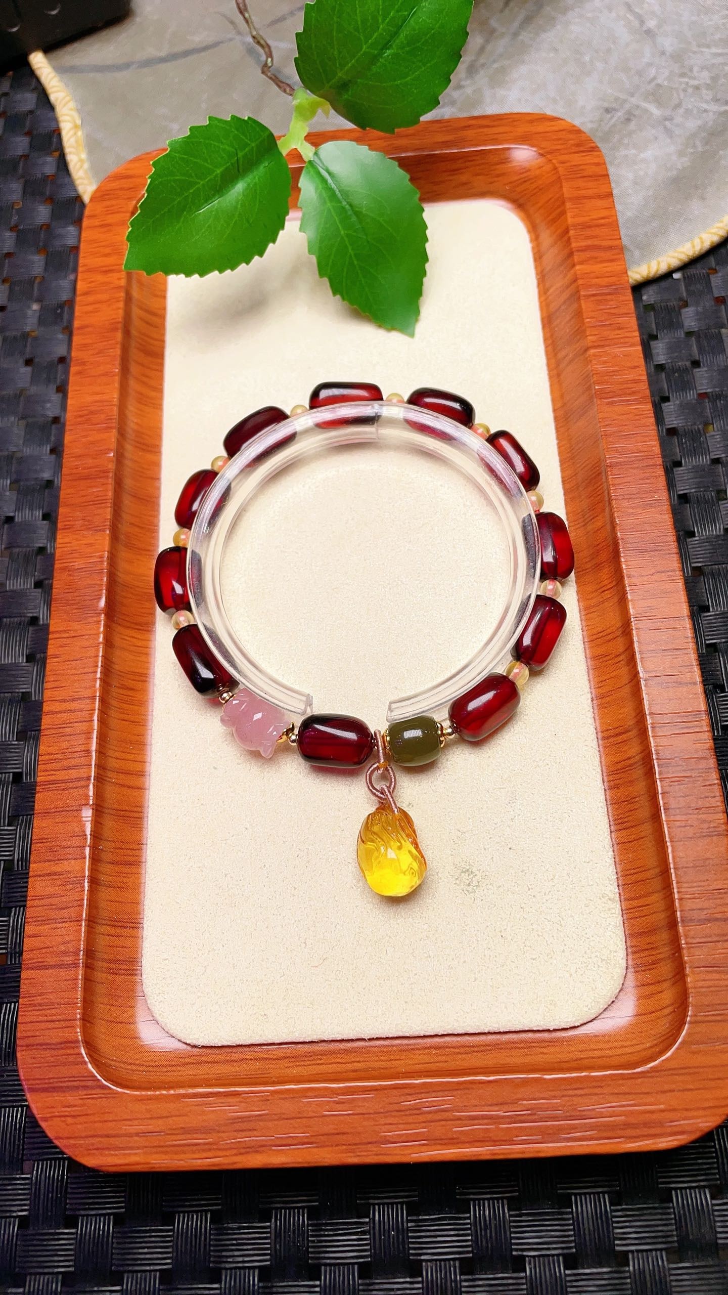 Original handmade custom natural blood amber freeform bracelet: Original handmade custom-made natural blood amber freeform bracelet with a lustrous color, measuring 7 x 13.1 mm. It features natural Hetian jade barrel beads, agate candy beads, and a natural amber c