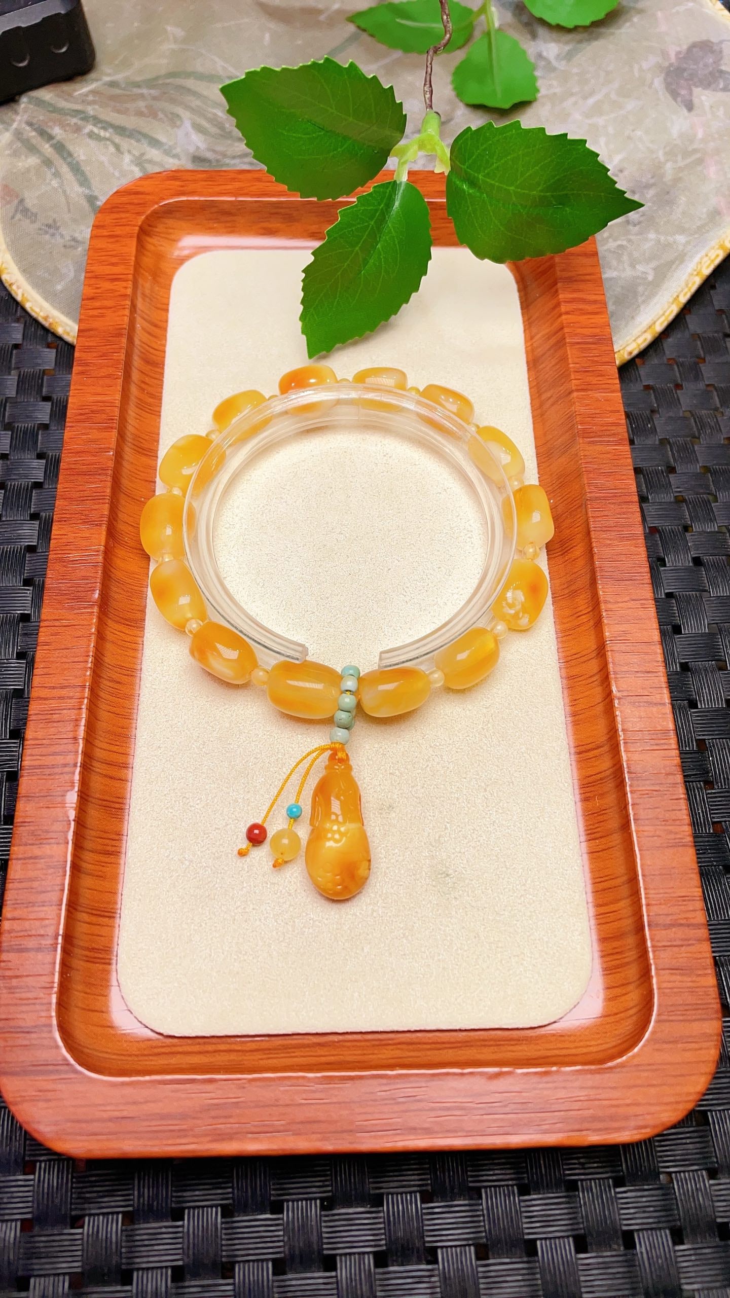 Original handmade custom natural amber freeform bracelet: Original handmade custom-made natural amber bracelet with a lustrous sheen. Size: 8.6 x 11 mm. Perfect for pairing with a natural amber cheongsam; stylish and versatile. Provenance:The Property of a G