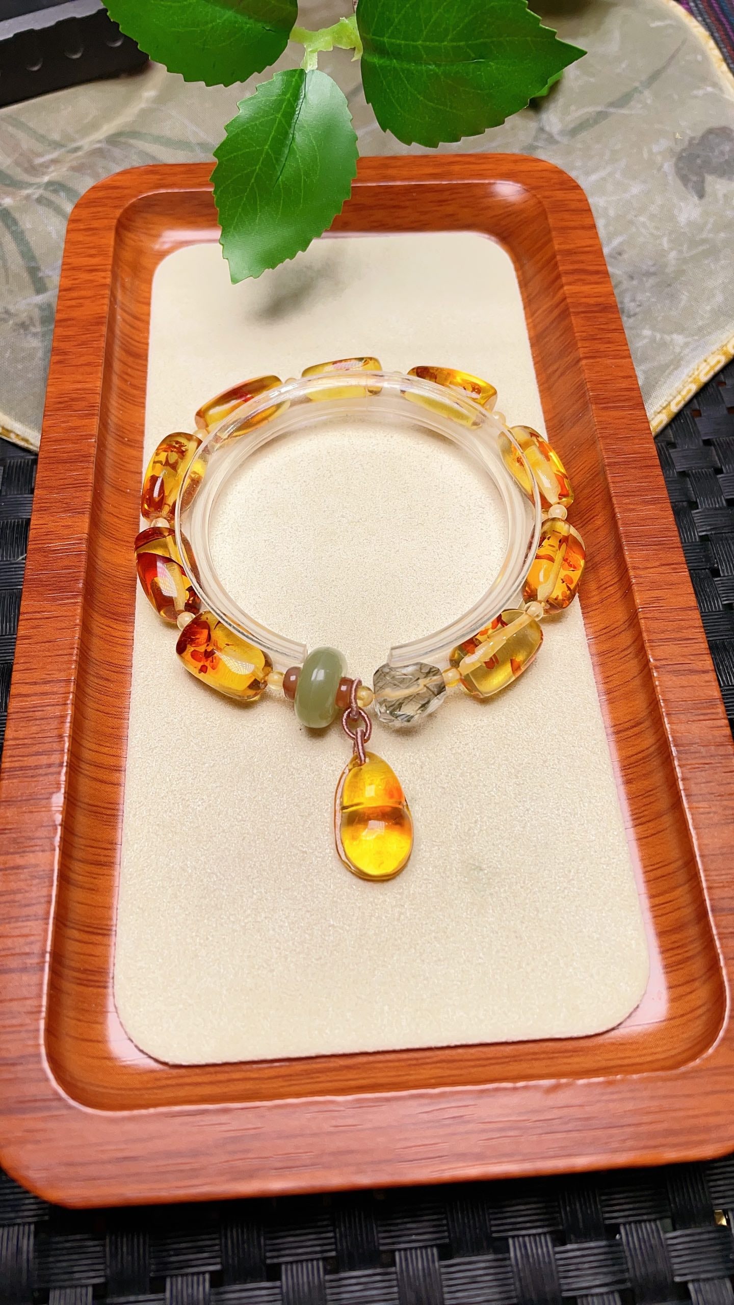 Original handmade custom natural amber flower shape bracelet: This original, handcrafted, custom-made natural amber bracelet features a lustrous, oily sheen. Dimensions: 8 x 15.6 mm. It includes natural Hetian jade beads, crystal multi-faceted beads, and a natur