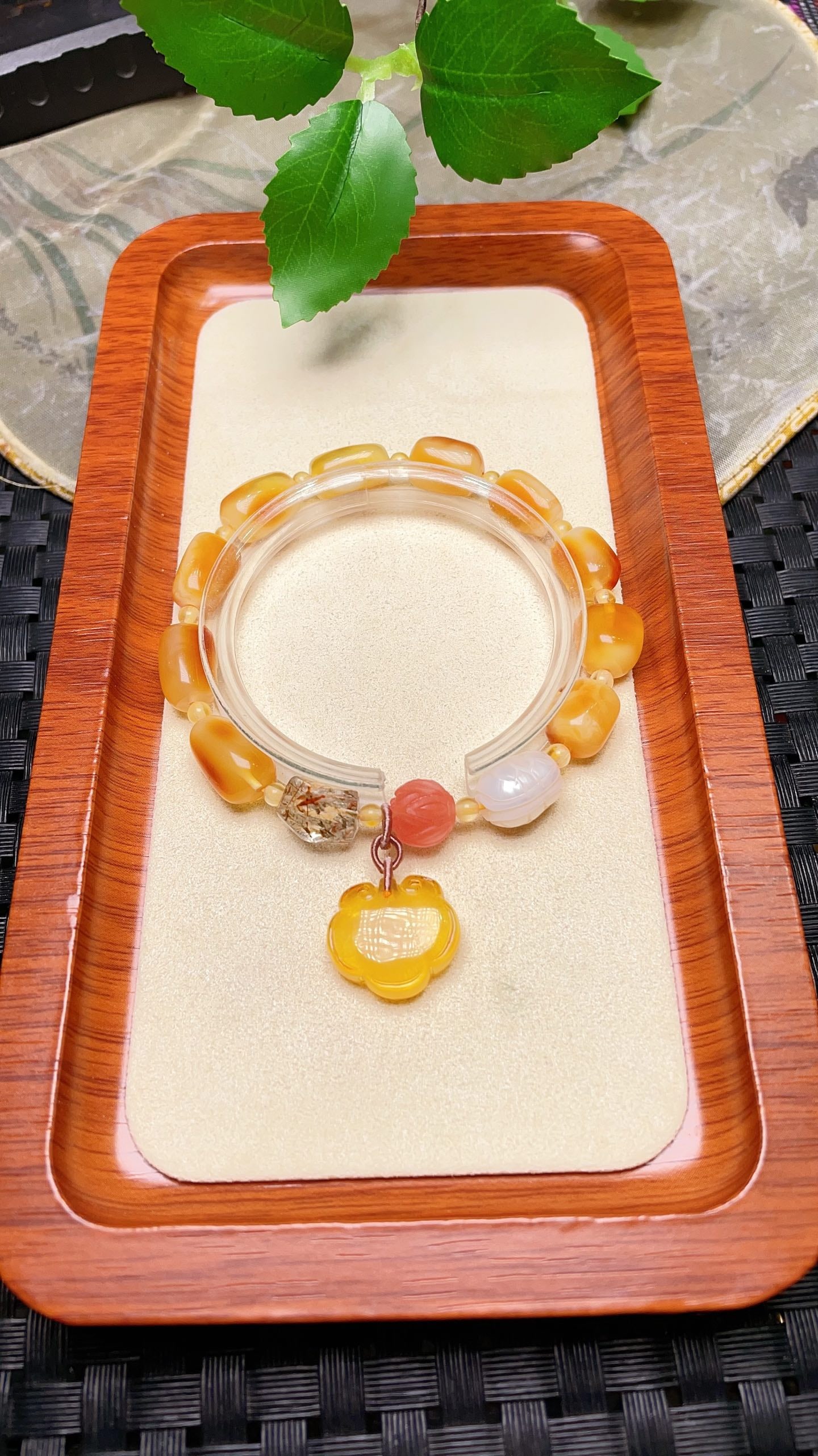 Original handmade custom natural amber freeform bracelet: This original, handcrafted, custom-made natural amber bracelet boasts a lustrous, oily sheen. Measuring 8.3 x 12.7 mm, it features natural pearl beads, red agate lotus beads, and multi-faceted crystal