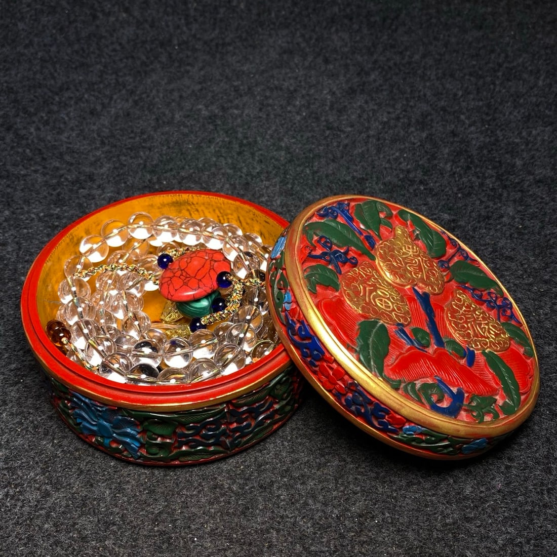 A precious crystal court bead is hidden inside a lacquerware jewelry box made for the imperial (1 of 11)