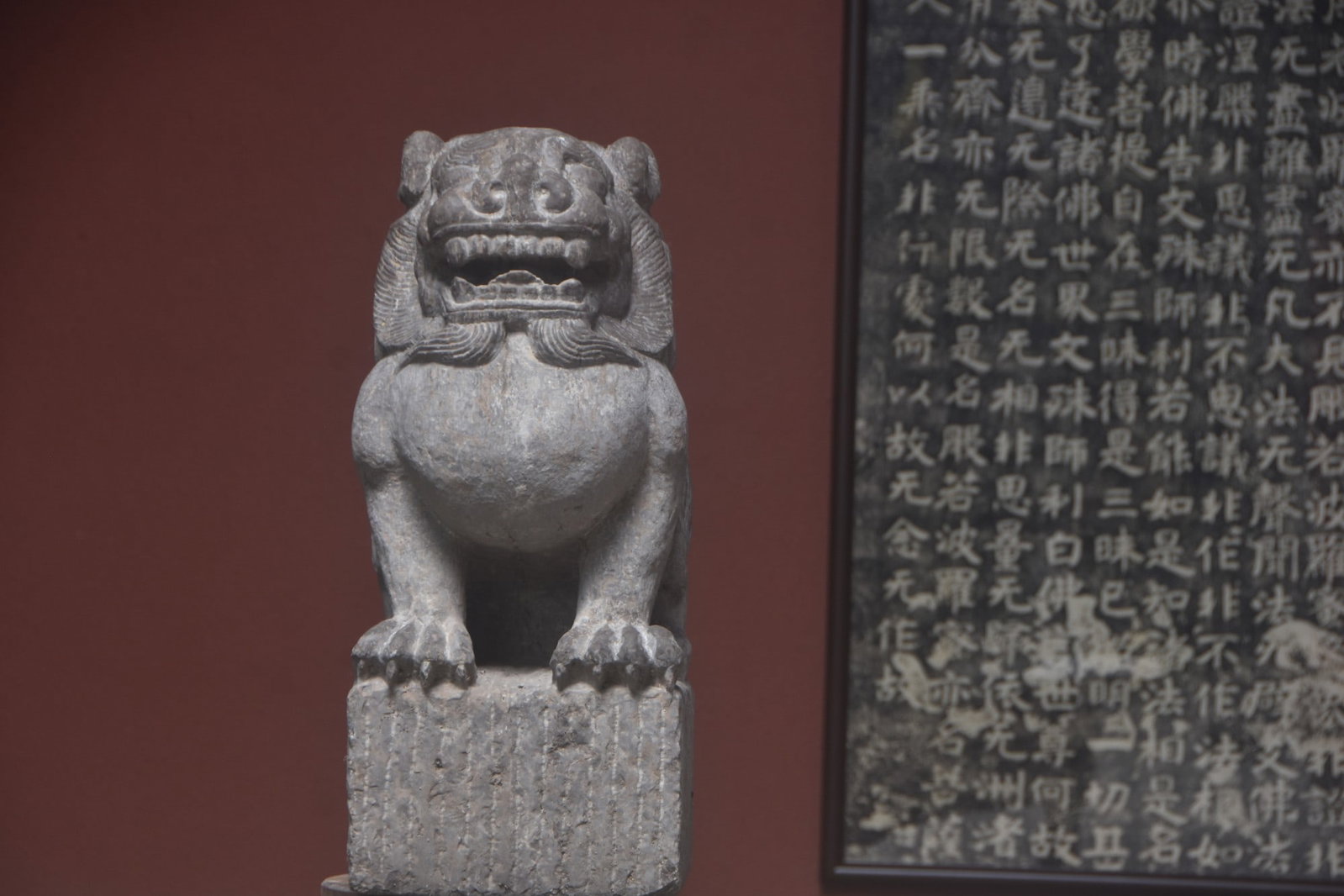 Bluestone (central hall lion): Ming Dynasty Style - Bluestone (Central Hall Lion) Dimensions: Height 54cm, Width 22cm, Thickness 38cm, Weight approximately 120 catties. The lion is seated with bold facial features, curly mane, and 