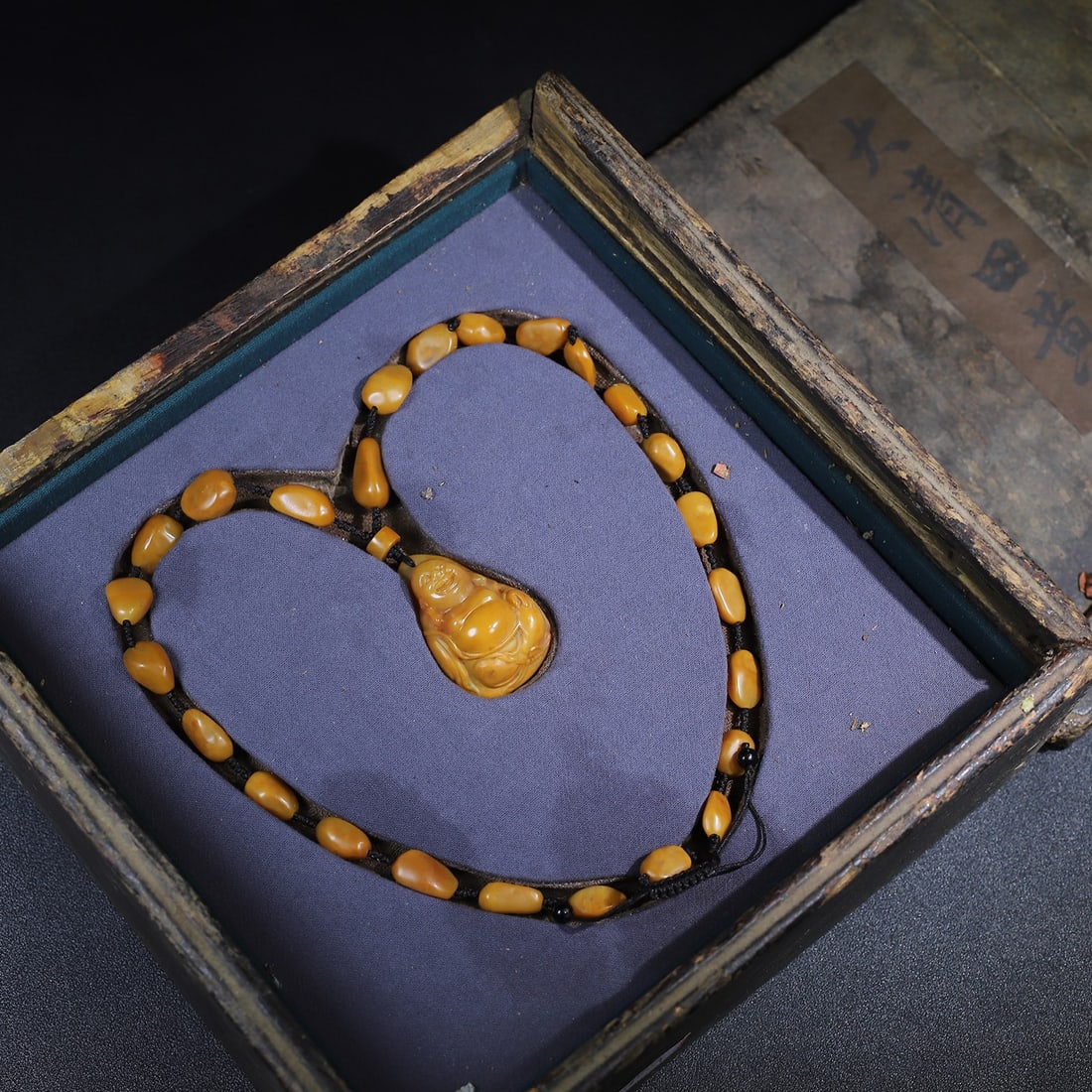 Collector's Shoushan Stone Maitreya Buddha Pendant Necklace: This is a collectible Shoushan stone Maitreya Buddha pendant necklace. The pendant is 5cm long, 3.5cm wide, and 2.5cm thick. The necklace weighs 111g. Provenance:Private collection from a professor in