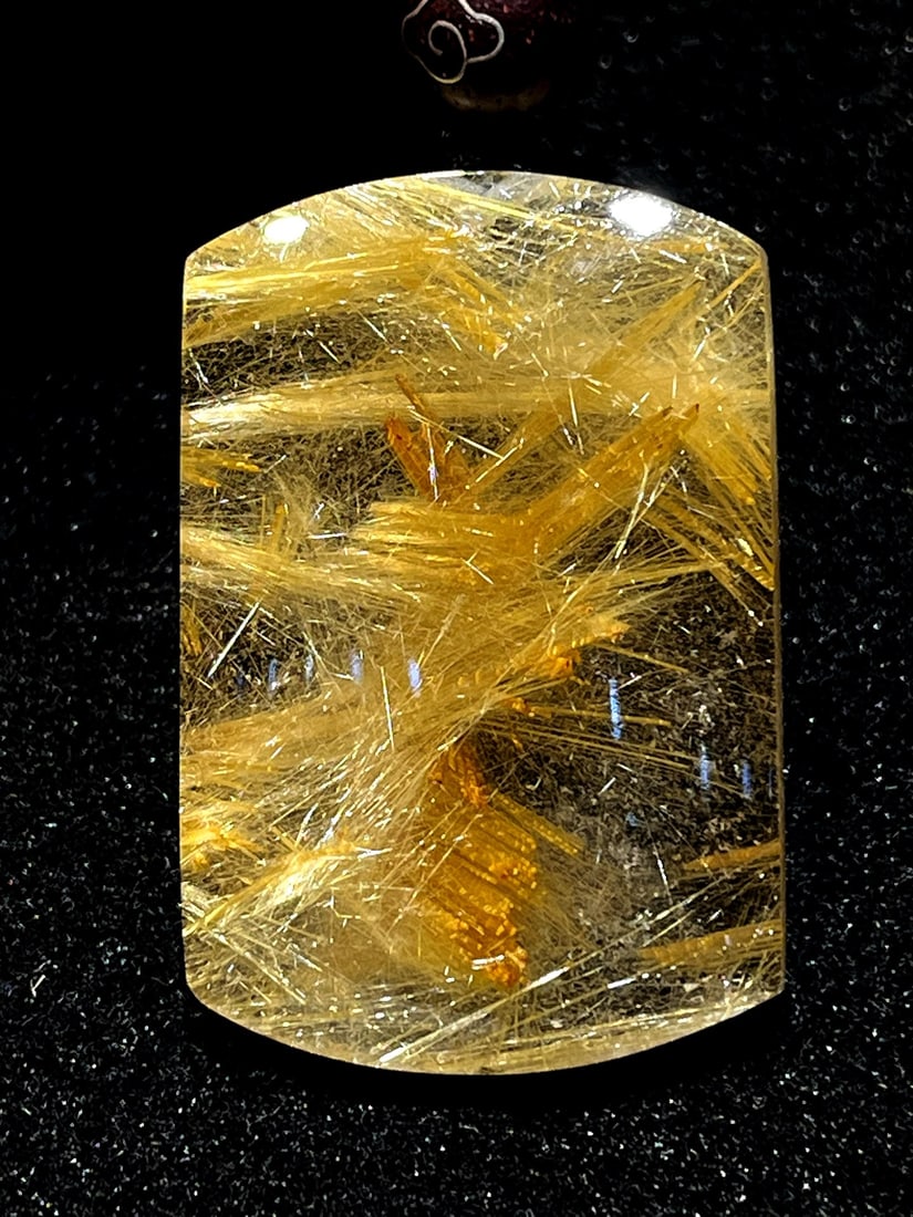 Pure natural golden rutilated quartz peace and safety pendant: This is a pure natural golden rutilated quartz pendant with a golden hue, thick and smooth rutile inclusions, and a brilliant, clear, and sparkling appearance. It's a beautiful and exquisite piece, we