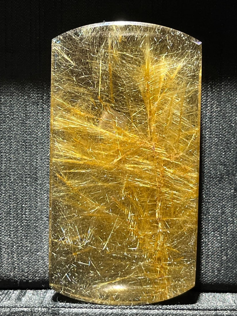 Natural Golden Rutilated Quartz, Smooth Hair, Peaceful and Tranquil Square Pendant: Natural golden rutilated quartz, smooth and lustrous, a square pendant symbolizing peace and tranquility. The crystal is clean and has a strong effect, resembling a treasure basin. The golden rutilate