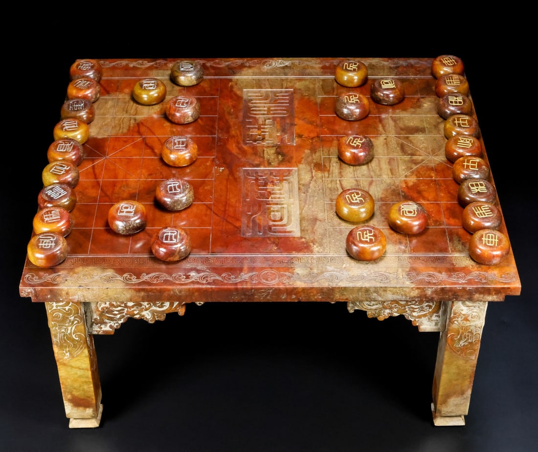 A set of Hetian jade chess pieces: This set of Hetian jade chess pieces features fine jade quality, exquisite carving, smooth lines, and perfect condition. Details are shown in the pictures. It measures 56cm in length, 50cm in width, a